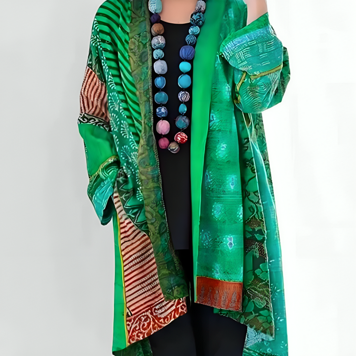 DAHLIENNE | CARDIGAN ELEGANTE IN MAGLIA CON TAGLIO STRATIFICATO