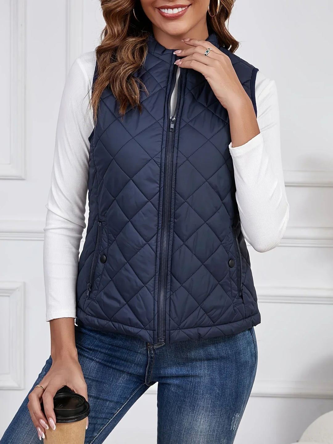 Gilet trapuntato senza maniche per donna con tasche con zip