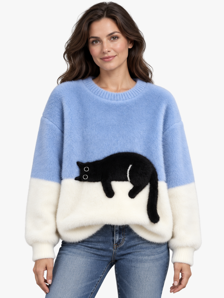 MAGLIONE LARGO A MOTIVO PER DONNE